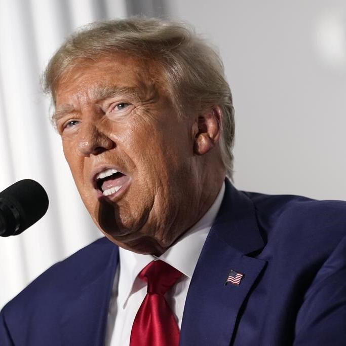 Justice Department urges judge to not postpone Trump's classified documents trial